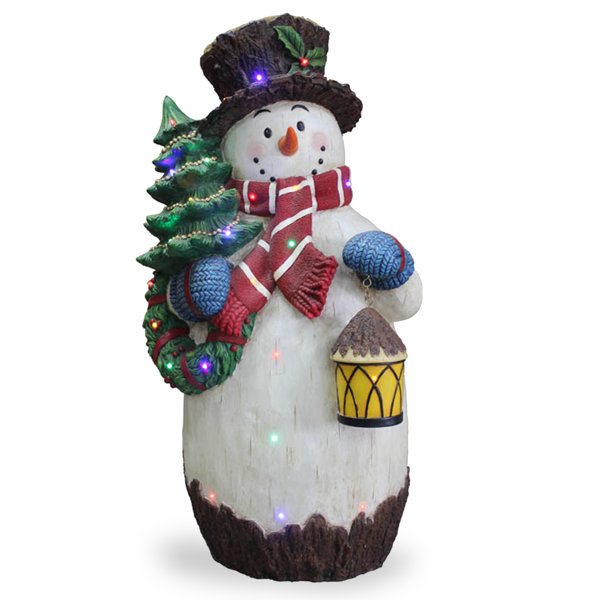 The Holiday Aisle® Snowman Holding Christmas Tree Figurine & Reviews